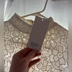 Lucy Paris high neck lace mini white dress